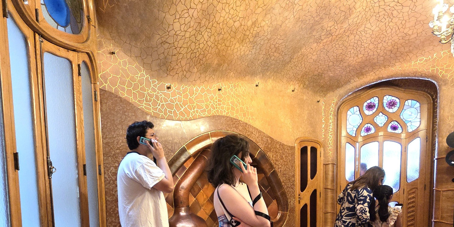 Two people using audio guide